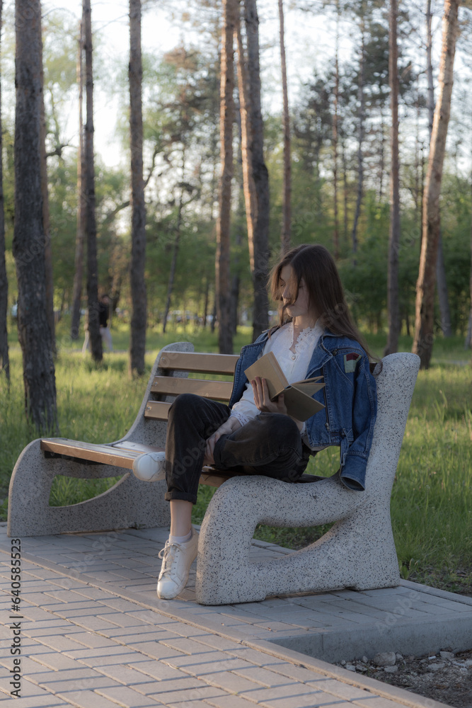 Portrait of a beautiful girl with a book. Portrait of a beautiful girl with a book.