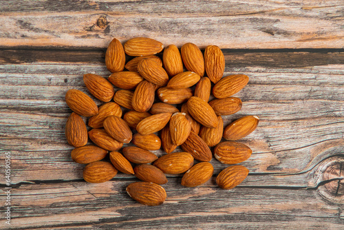 Almonds seed on wooden background