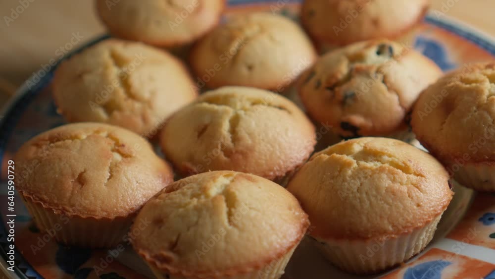 Appetizing homemade cakes, ruddy cupcakes stacked on plate. Appetizing homemade cakes, ruddy cupcakes stacked on plate.