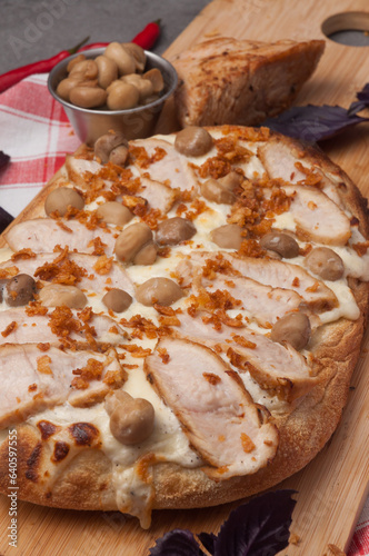 italian pizza with turkey and mushrooms