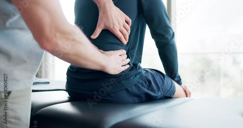 Chiropractor, hands and and patient with back pain in rehabilitation, physical therapy or person massage stress in muscle. Physiotherapist, healing or helping man in physio, health or care for injury