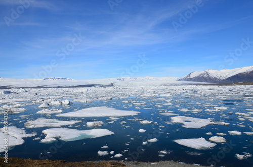 Vászonkép Stunning Icebergs with Floating Ice in a Lagoon