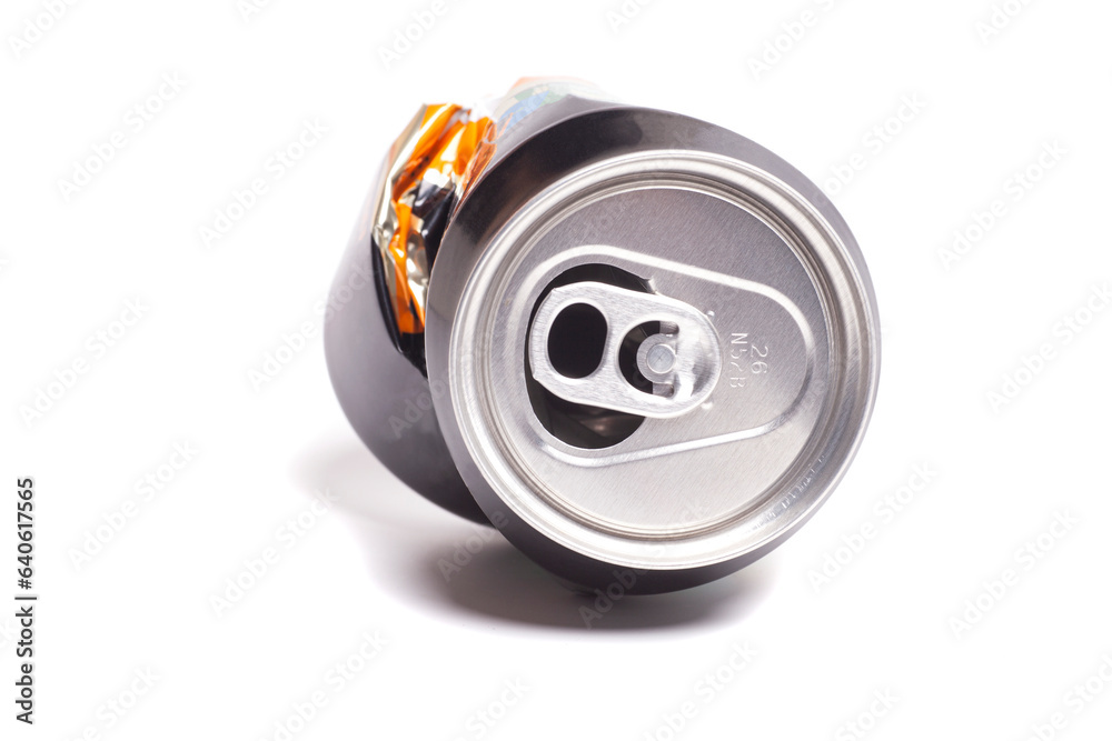 Empty crumpled red can from energy drink or beer Empty crumpled red can from energy drink or beer