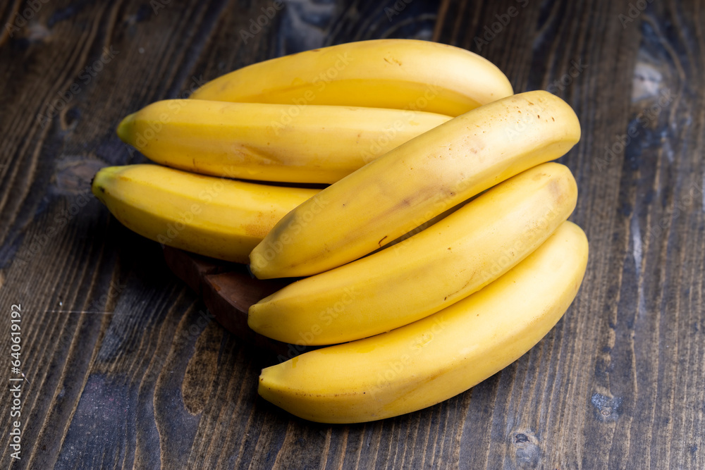Ripe yellow bananas on the table Ripe yellow bananas on the table