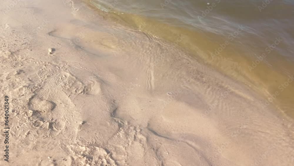 Summer beach nature , top view waves on the sandy beach, hotizontal footage Summer beach nature , top view waves on the sandy beach, hotizontal footage