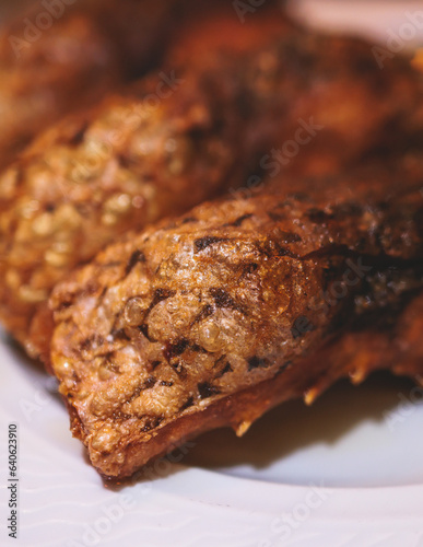 Wallpaper Mural Fried grilled carp, roasted carp fish on plate with lemon and salad served in a traditional restaurant in Montenegro, Skadar lake, prepared cooked crucian carp steak, balkan dish, Montenegrin cuisine Torontodigital.ca