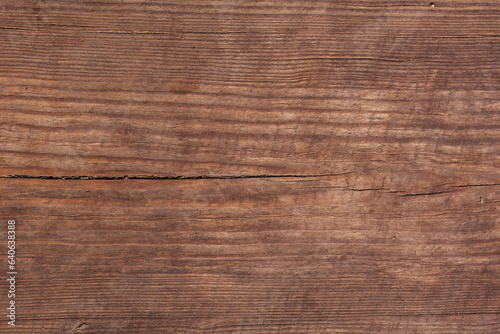 Brown scratched wood texture, old background. Old wood texture.