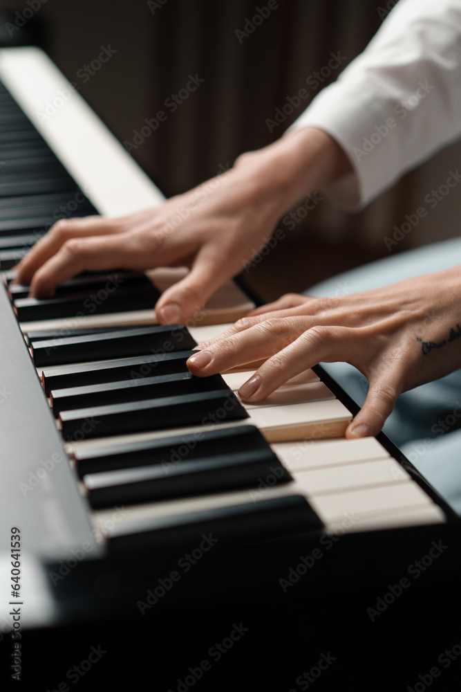 Fototapeta premium hands playing piano