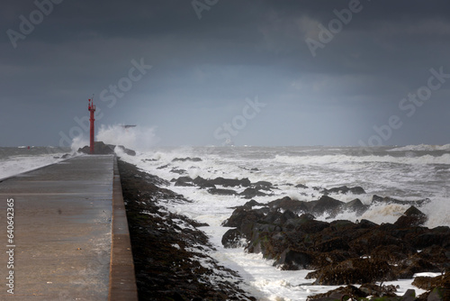 Stormy weather at the pier of Hoek van Holland, a seaside and port town along the Dutch coast near Rotterdam; Hoek van Holland, Netherlands