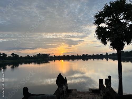 Sunrise seen from an artificial pond built for the king's ablution, Srah Srang, Angkor ruins, Siem Reap, Cambodia photo