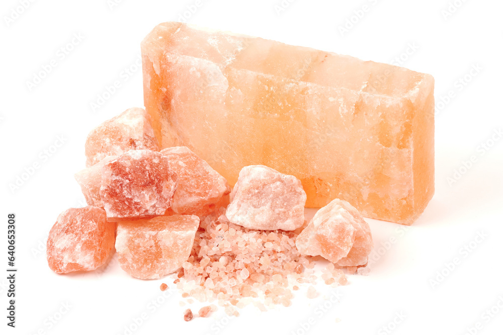 Chipped Himalayan salt stone, crystals and crushed blocks of natural pink salt isolated on white background Chipped Himalayan salt stone, crystals and crushed blocks of natural pink salt isolated on white background