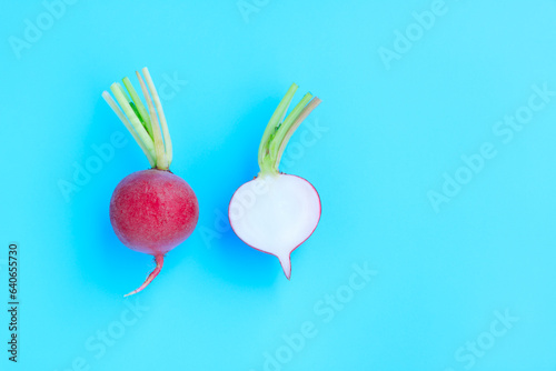 Fresh radish and sliced on blue background, Organic vegetable