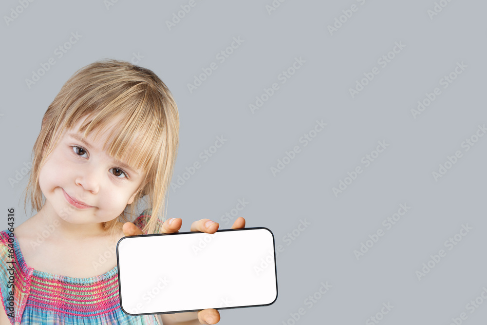 Cute baby girl showing smartphone with blank empty white screen display
