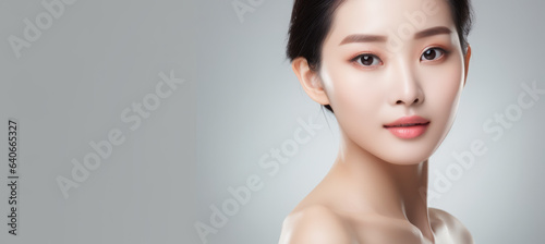 Banner with asian Chinese woman face with smooth health skin for advertising design. Korean or Japanese young looking woman background