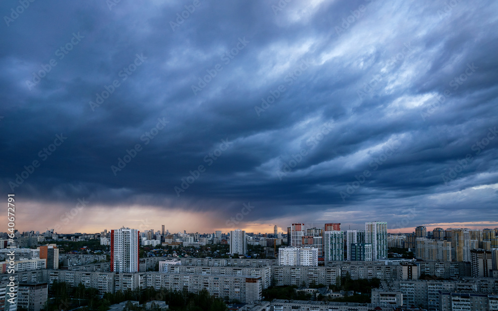 Dawn clouds over the metropolis of early winter sunset Dawn clouds over the metropolis of early winter sunset