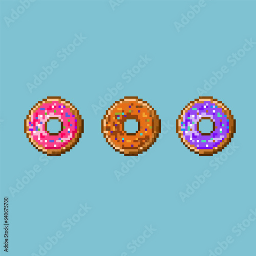 Pixel art sets of Donuts items on pixelated style. Pink,purple,and cokelat donut assets item. Pixel art,8bits perfect for game asset or design asset element for your game design asset.