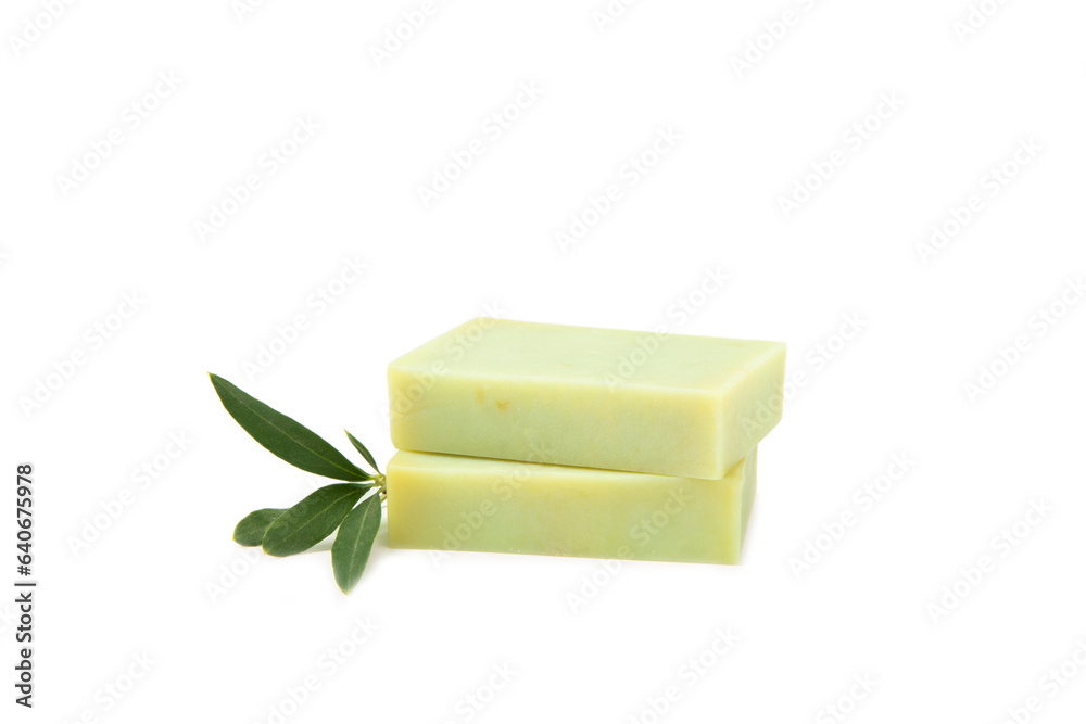 Natural bar of soap with olive oil extract isolated on white background. Pieces of green soap on a white background. Natural bar of soap with olive oil extract isolated on white background. Pieces of green soap on a white background.