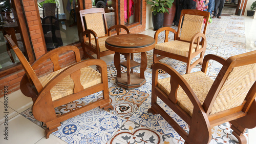 Photos wooden vintage brown teak chair outdoor on porch of javanese house or joglo with