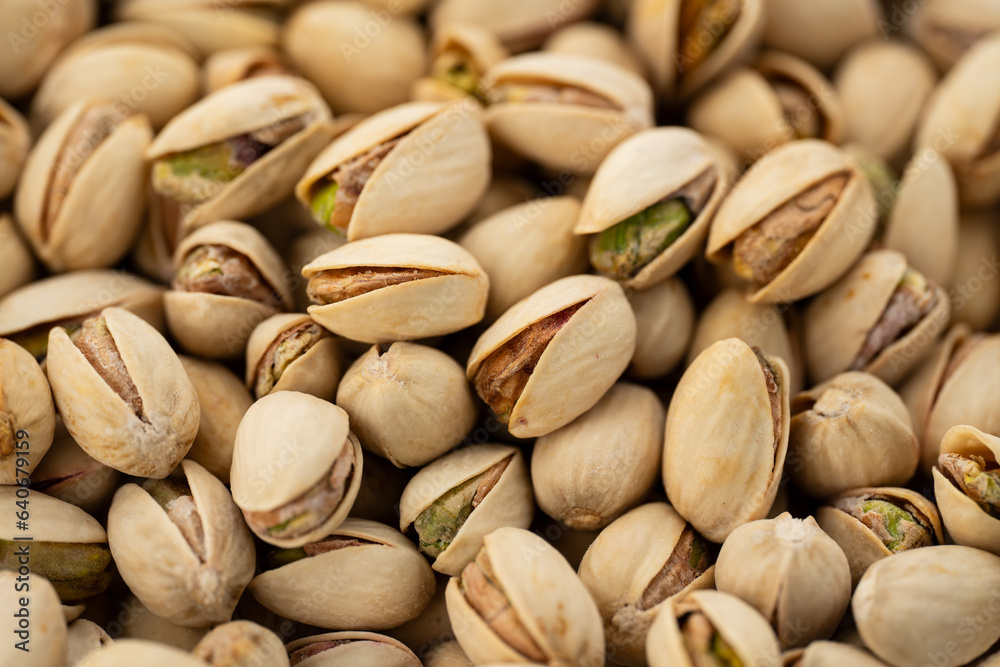 Salted Pistachios for Beer, Macro, Spin. Isolated Background of a Beer Snack of Salted Pistachio Nuts. Healthy Delicious Pistachios. Salted roasted pistachio macro, Salted Pistachios for Beer, Macro, Spin. Isolated Background of a Beer Snack of Salted Pistachio Nuts. Healthy Delicious Pistachios. Salted roasted pistachio macro,