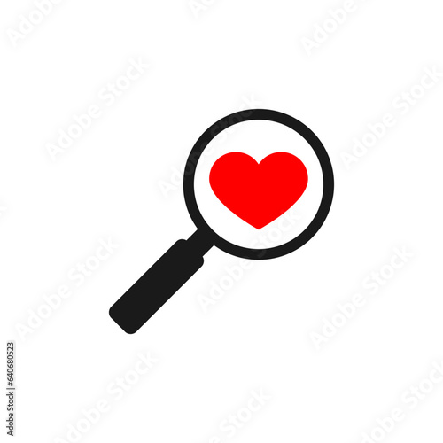 Magnifying glass with a heart inside.