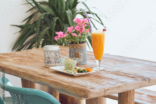 Breakfast served on wooden table