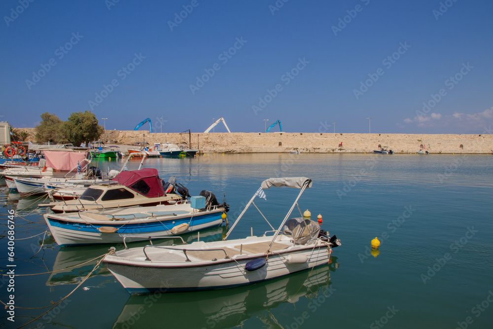 Harbor with boats and Mediterranean Sea at Rethymno, Crete, Greece
