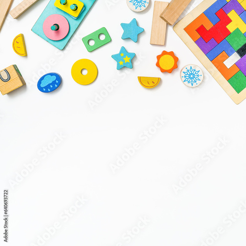 Kids toys on white background. Top view. Flat lay. Copy space for text