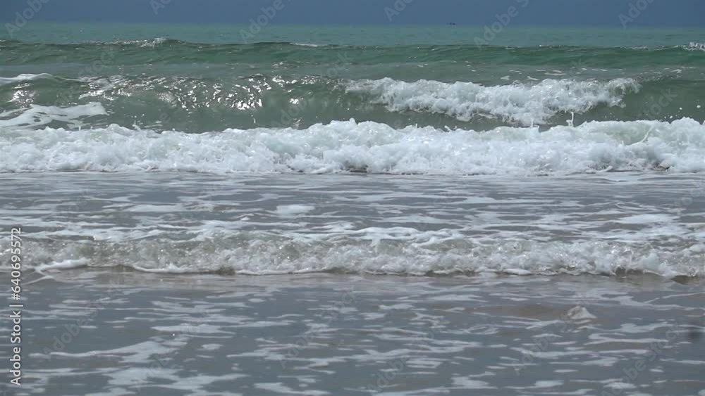 Slow Motion Shot Of Ocean Waves Crashing On Sandy Beach Slow Motion Shot Of Ocean Waves Crashing On Sandy Beach