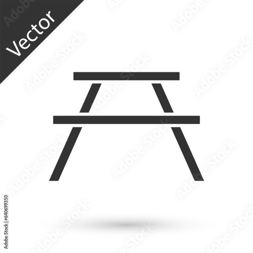 Grey Picnic table with benches on either side of the table icon isolated on white background. Vector Illustration