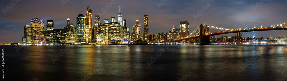 Panorama of city skyline of Manhattan, New York city at night.