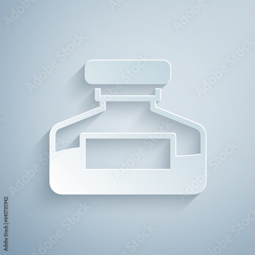 Paper cut Ink bottle icon isolated on grey background. Calligraphy supplies for fountain pen. Paper art style. Vector
