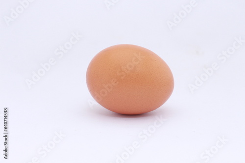 raw chicken egg isolated on white background