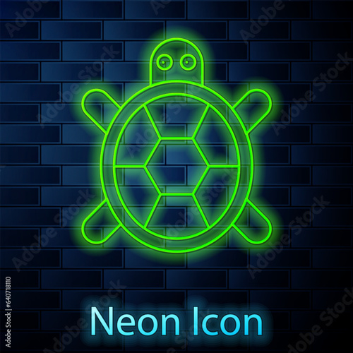 Glowing neon line Turtle icon isolated on brick wall background. Vector.