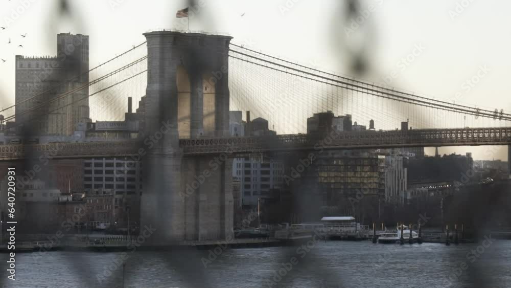 Brooklyn Bridge in New York filmed through fence