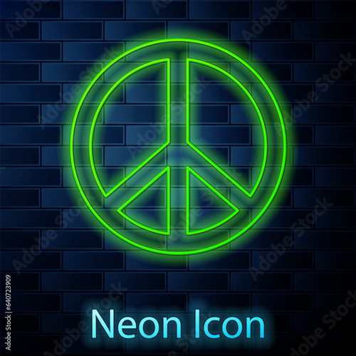 Glowing neon line Peace icon isolated on brick wall background. Hippie symbol of peace. Vector