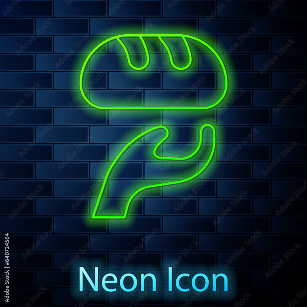 Glowing neon line Donation food icon isolated on brick wall background. Vector