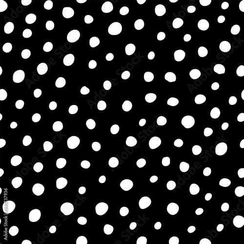 Simple pattern with hand drawn scribble dots. Seamless vector minimalistic pattern on black background. Doodle print