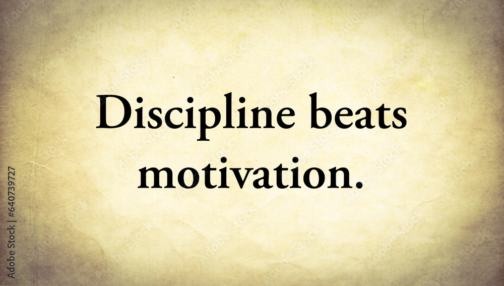 Old paper background with text. Discipline beats motivation.