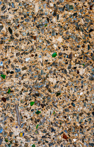 Background and texture made from colored stones pebbles and sand.