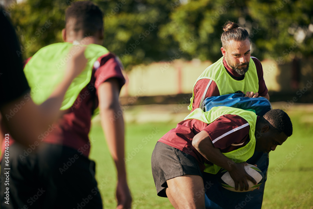 Obraz premium Sports, team and men in field for rugby training, workout and exercise on grass field for competition. Fitness, collaboration and athletes with ball tackle for practice, match and game for challenge