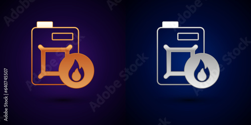 Gold and silver Canister for motor machine oil icon isolated on black background. Oil gallon. Oil change service and repair. Engine oil sign. Vector
