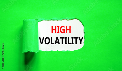 High volatility symbol. Concept words High volatility on beautiful white paper. Beautiful green paper background. Business high volatility concept. Copy space.