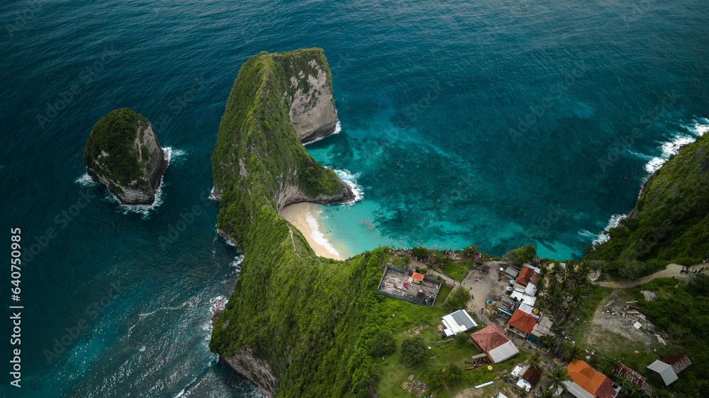 Tropical Paradise: Aerial View of Nusa Penida's T-Rex Cliff and Kelingking Beach. Bali's Oasis of Crystal Clear Waters, Pristine Beaches, and Breathtaking Coastline in Asia's Vacation Destination