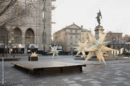 Old Montreal, Place d'Armes with Notre Dame Basilica in the background with Christmas decorations. photo