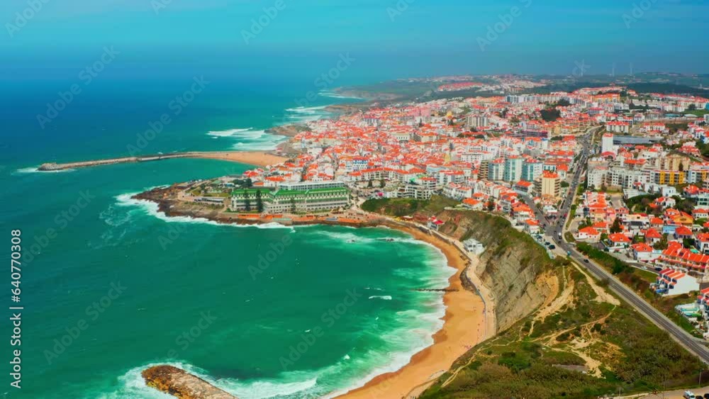 Drone aerial view over beaches, coastlines in Ericeira, Portugal, on summer sunny day. Drone is flying over Beautiful European touristic town. Beautiful cityscape with skyline, ocean rocky shore Drone aerial view over beaches, coastlines in Ericeira, Portugal, on summer sunny day. Drone is flying over Beautiful European touristic town. Beautiful cityscape with skyline, ocean rocky shore
