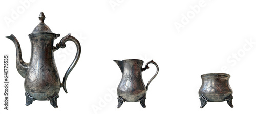 set old antique silver ware: coffee pot, creamer and sugar bowl isolated on transparent background
