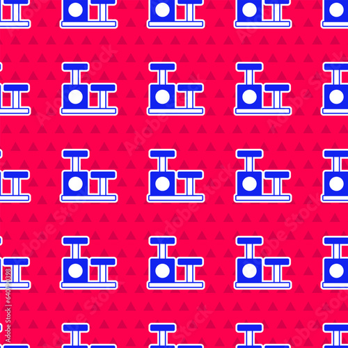 Blue Cat scratching post with toy icon isolated seamless pattern on red background. Vector