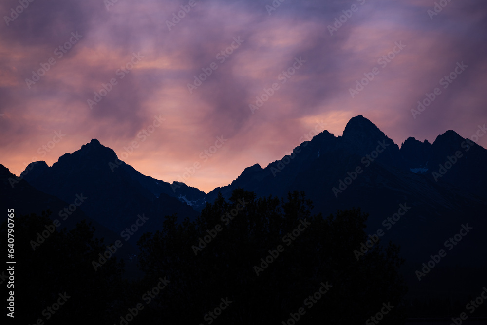 Pink evening sky over the Tatra mountains in Slovakia
