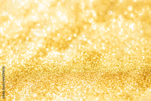 Gold glitter defocused texture background. gold christmas abstract background. © Achira22