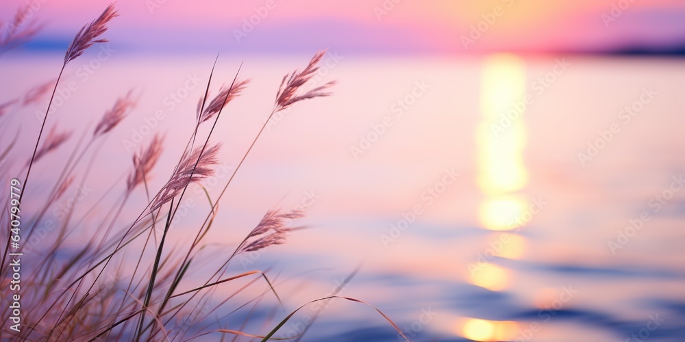 Obraz premium AI Generated. AI Generative. Pink and purple grass stem on lake sea water background. Soft pastel colors background. Lovely relax romantic vibe decoration